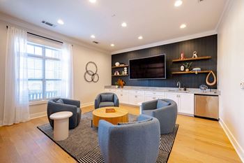 Living room with chairs and television