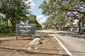 Austin apartment for rent - Property Sign at Woodview Apartments, Austin