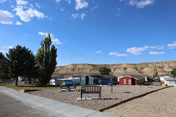 Rock Springs apartment for rent - A park with a bench and a playground.