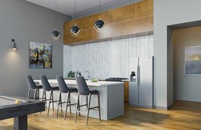 Colorado Springs apartment for rent - A modern kitchen with a pool table and bar stools.