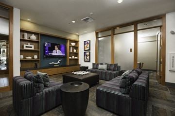 Seattle apartment for rent - A living room with a television and a couch.