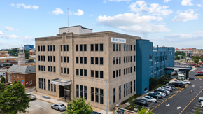 Norfolk apartment for rent - an aerial view of a large building in a city with a parking lot