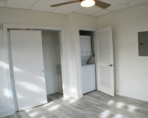 Richmond apartment for rent - A room with a white door and a white refrigerator.