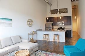 Norfolk apartment for rent - A kitchen area with a bar stool and a countertop.