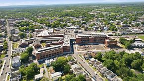 Martinsburg apartment for rent - An aerial view of a town with a large building in the center.