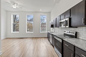Richmond apartment for rent - Photo of kitchen and living space facing Broad Street in Richmond, Virginia