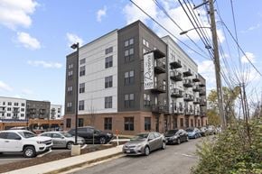 Richmond apartment for rent - A grey building with the number 1429 on it.