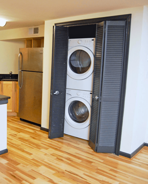 Richmond apartment for rent - A washer and dryer are in a small laundry room.