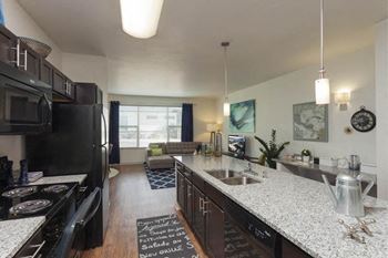 Kitchen with espresso cabinets and kitchen island 