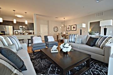 Livingston apartment for rent - a living room with couches and chairs and a table