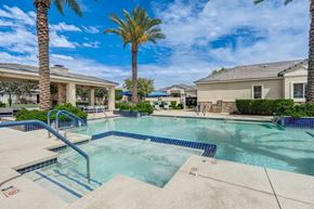 Litchfield Park apartment for rent - Resort style pool with spa and palm trees at Vistoria On Camelback Apartments, Litchfield Park, AZ 85340
