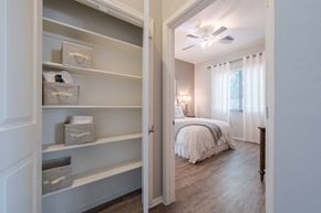 Surprise apartment for rent - Bedroom with built in storage shelving at Vistoria On Greenway Apartments, Surprise, AZ