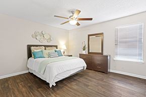 Oklahoma City apartment for rent - a bedroom with a bed and a ceiling fan at Diamond  Trail Apartments, Oklahoma City, Oklahoma