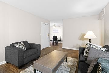 Oklahoma City apartment for rent - a living room with a couch and a coffee table