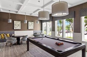 Ashland apartment for rent - a recreation room with a pool table and chairs at Cirrus Apartments, Ashland, MA