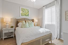 Laveen apartment for rent - a bedroom with a large bed and a window at Sienna at South Mountain Apartments, Laveen, AZ, 85339