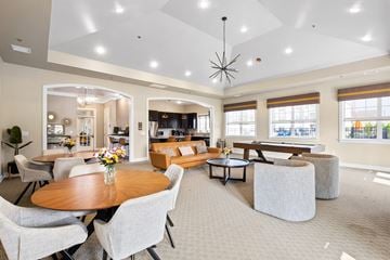 Hazlet apartment for rent - a living room with couches and chairs and a table