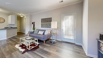 A living room with a couch and a coffee table