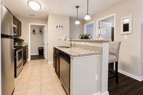 Chattanooga apartment for rent - A kitchen with a granite counter top and stainless steel appliances.