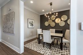 Murfreesboro apartment for rent - a dining room with a table and chairs and a chandelier at Annandale Apartment Homes, Murfreesboro, TN
