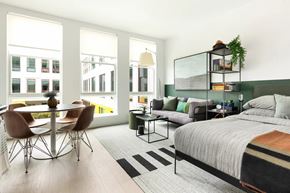 Jersey City apartment for rent - Open studio layout with dining area and bedroom space at 295J Apartments, Jersey City, NJ