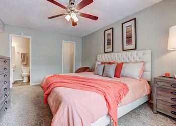 Bedroom with a bed and a ceiling fan