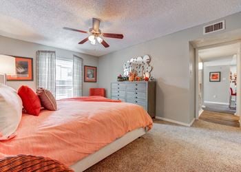 Bedroom with a bed and a ceiling fan
