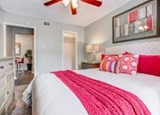College Station apartment for rent - Bedroom with a bed and a ceiling fan at Sausalito Apartments, College Station, TX