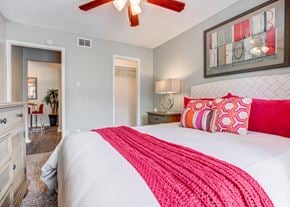 College Station apartment for rent - Bedroom with a bed and a ceiling fan at Sausalito Apartments, College Station, TX