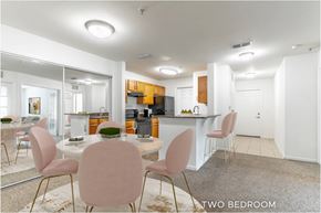 Daytona Beach townhouse for rent - A modern kitchen with a dining table and chairs.