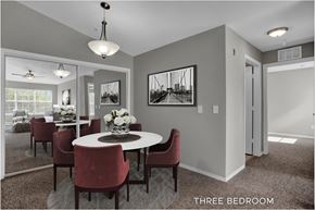 Eustis apartment for rent - A dining room with a table set for six and a large window.