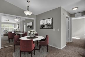 Eustis apartment for rent - A dining room with a round table and chairs.