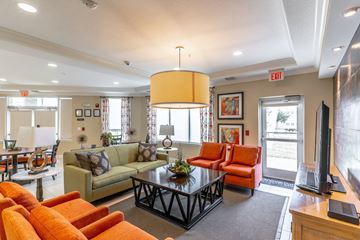 Port St. Lucie apartment for rent - a living room with couches and chairs and a table