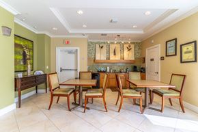Rockledge apartment for rent - a clubhouse with tables and chairs