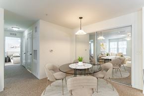 Rockledge apartment for rent - a dining room with a glass table and chairs