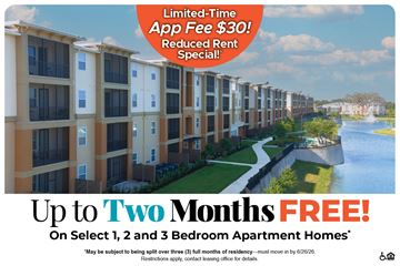 Lady Lake apartment for rent - Apartment complex with a sign offering a limited-time app fee discount.