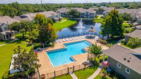 Kissimmee apartment for rent - aerial view of pool, clubhouse and lake area