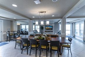 Maitland apartment for rent - clubhouse with tables and tv
