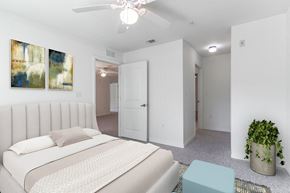 Maitland apartment for rent - a bedroom with a white bed and white walls