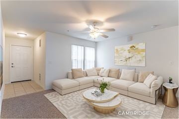 Rockledge apartment for rent - A living room with a large sectional sofa and a coffee table.