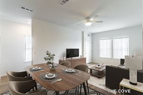Mount Dora apartment for rent - A dining room with a wooden table set for six.