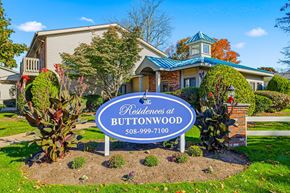 New Bedford apartment for rent - A sign for the Residences at Buttonwood with a phone number on it.