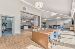 Fall River apartment for rent - A conference room with a long table and chairs.