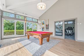 Fall River apartment for rent - A room with a pool table and a red cloth on it.