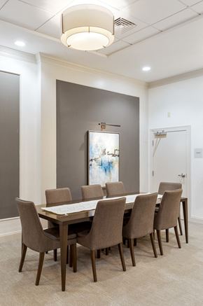 Westwood apartment for rent - a dining room with a long table and chairs
