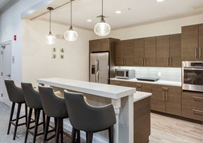 Westwood apartment for rent - a kitchen with a large island and chairs