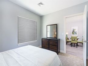 Fall River apartment for rent - a bedroom with a white bed and a dresser