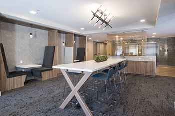 Long table with chairs and seating booths