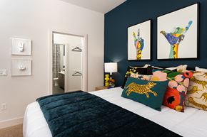 Atlanta apartment for rent - Colorful Bedroom with Accent Pillows and Ensuite Bathroom Access