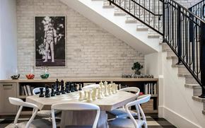 Cary apartment for rent - Clubhouse Lounge with Modern Chess Table, Built-In Bookshelves & Artful Decor